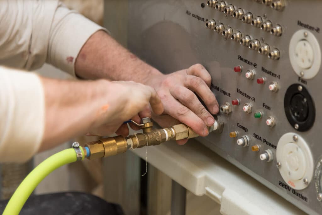 Technician Setting-Up Aerobarrier Machine