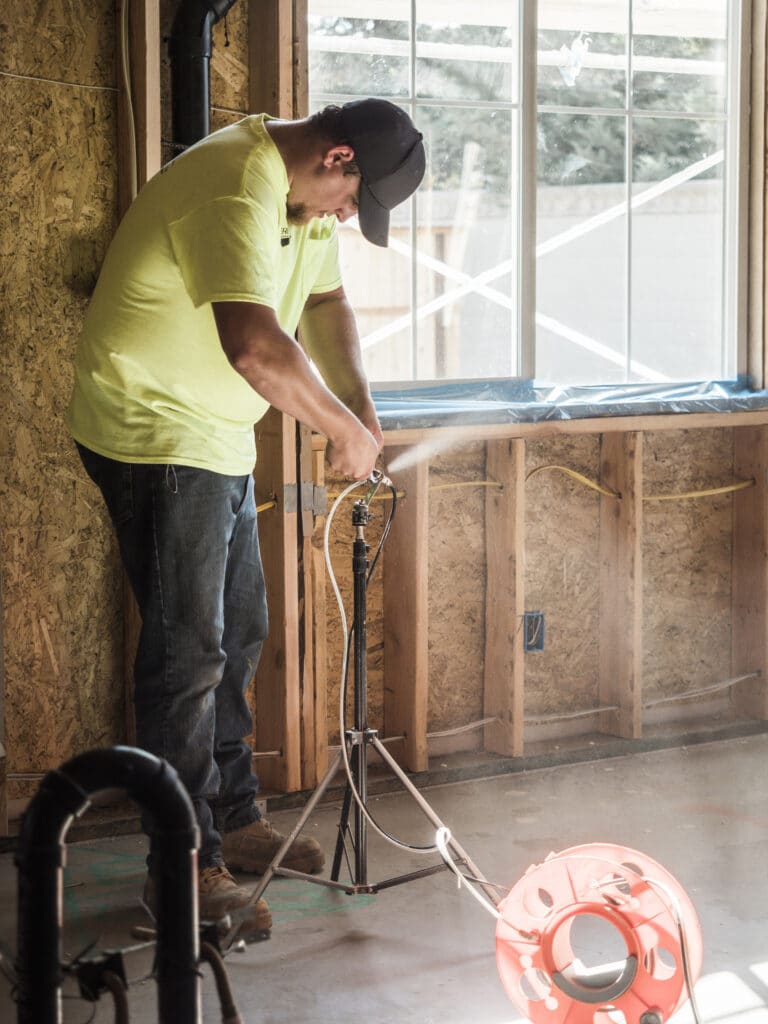 Technician Applying Sealing With Aerobarrier